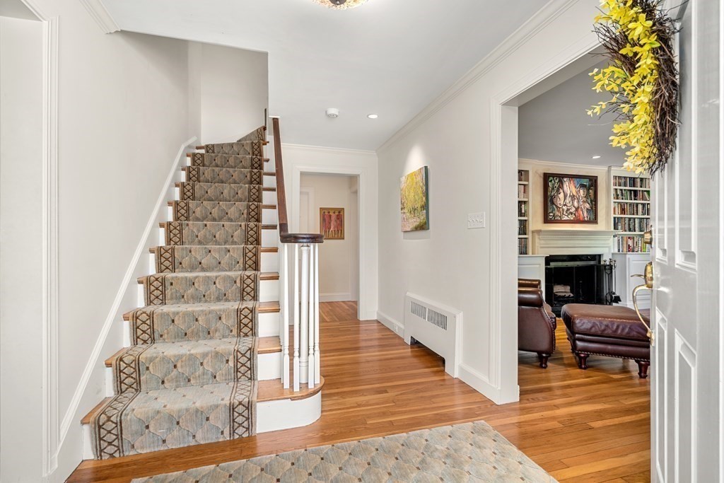 21 Appleby Road Wellesley, MA 02482 - Photo 2 of 29 a view of living room with furniture and a fireplace