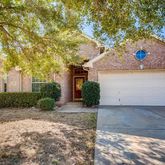 a view of a yard in front of a house