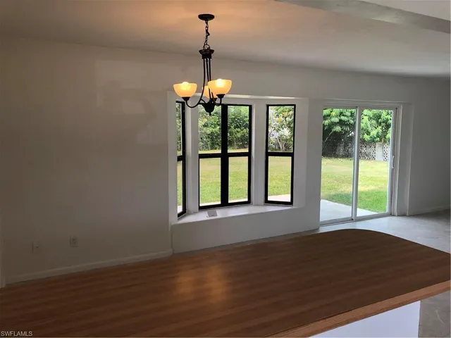a bathroom with a sink and shower