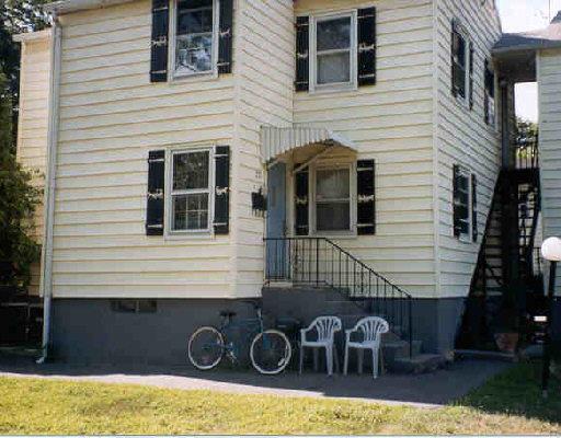 77 Hibiscus Street, Unit 31 Fairfield, CT 06825 - Photo 1 of 1 a front view of a house with garden