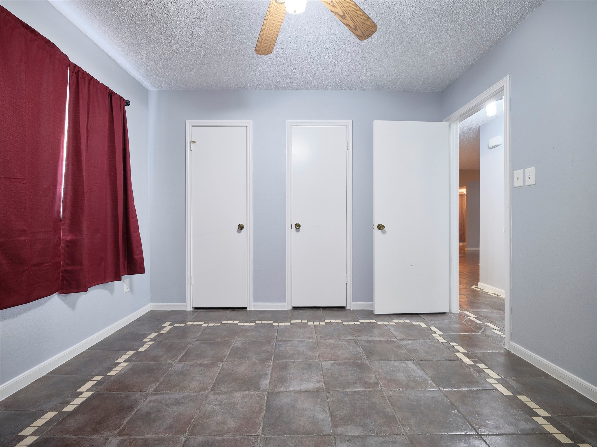 1520 Crestmont Street Wharton, TX 77488 - Photo 23 of 38 a view of room with window and hardwood floor