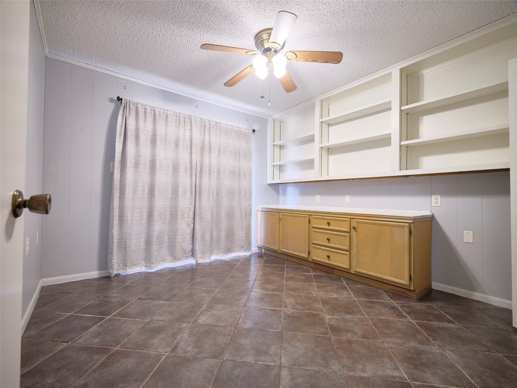 1520 Crestmont Street Wharton, TX 77488 - Photo 27 of 38 a view of kitchen with a sink and cabinets