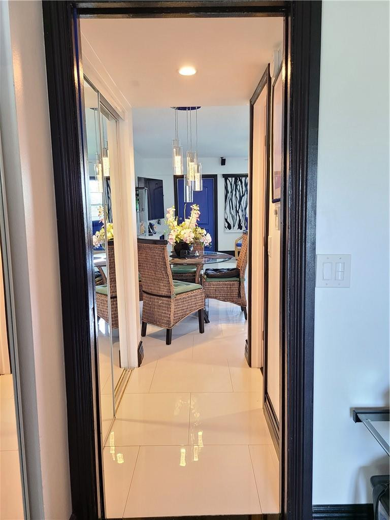 163 Suffolk F, Unit 163 Boca Raton, FL 33434 - Photo 17 of 34 a living room with furniture and a fireplace