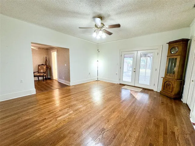 a view of a livingroom with wooden floor