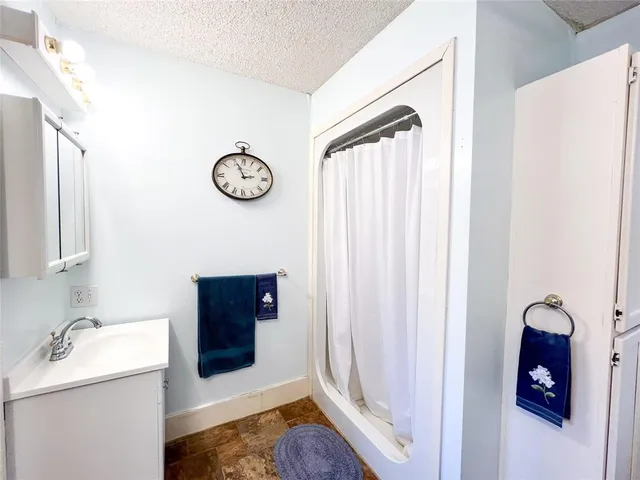 a view of a hallway with washer and dryer
