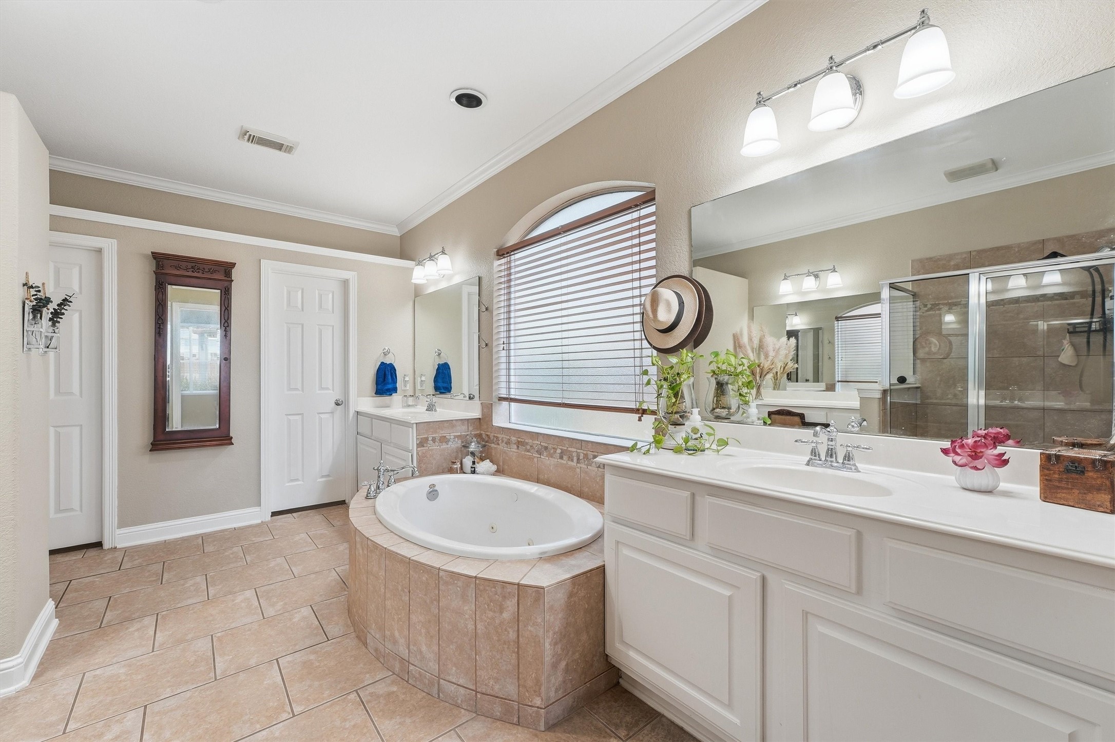 25181 Ramrock Drive Porter, TX 77365 - Photo 14 of 35 a bathroom with a sink double vanity granite and a mirror