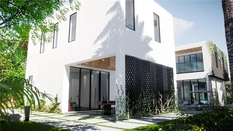 a view of a brick building with many windows