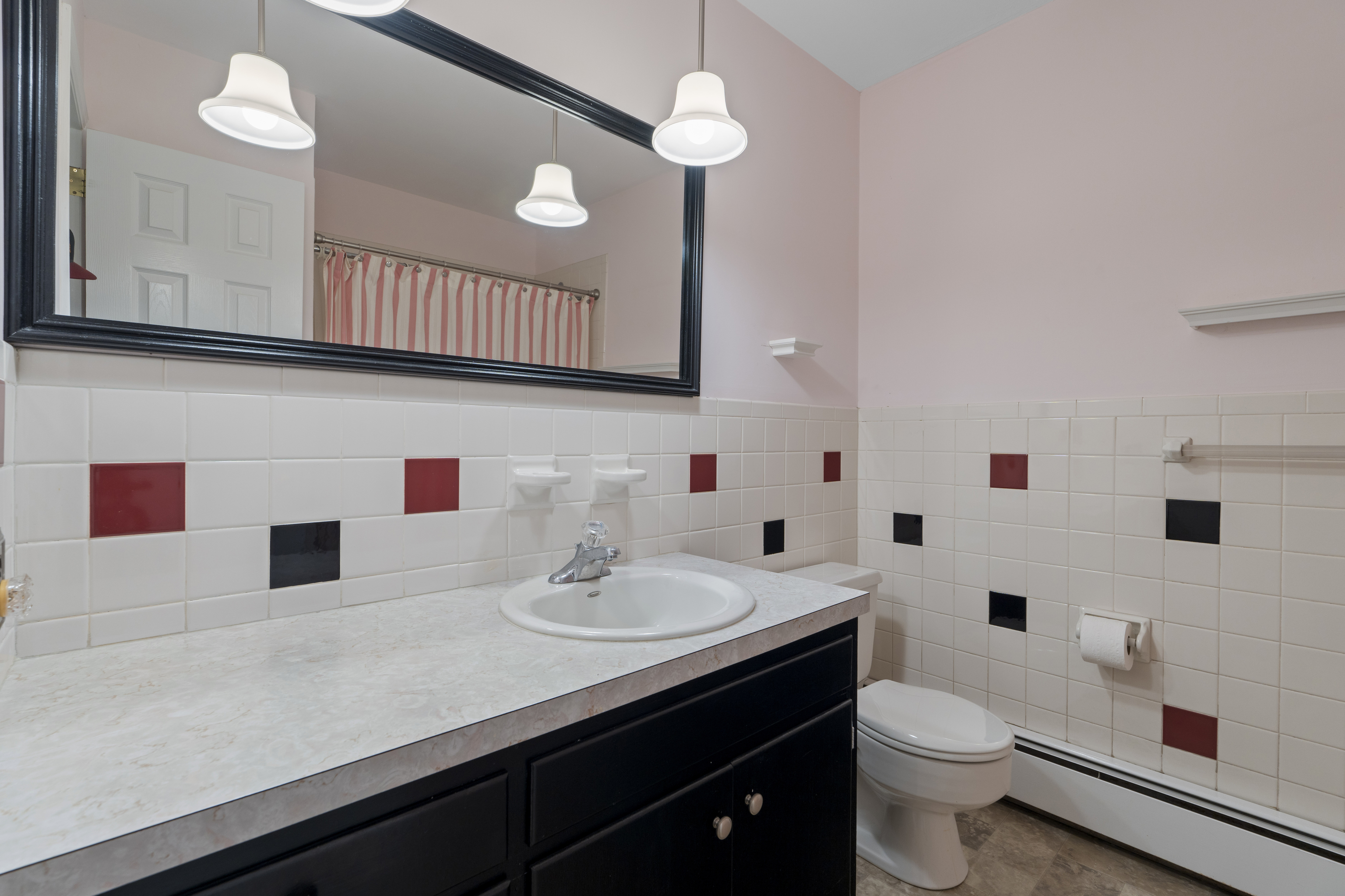 3 Parsell Lane Westport, CT 06880 - Photo 17 of 29 a bathroom with a sink a toilet and a mirror