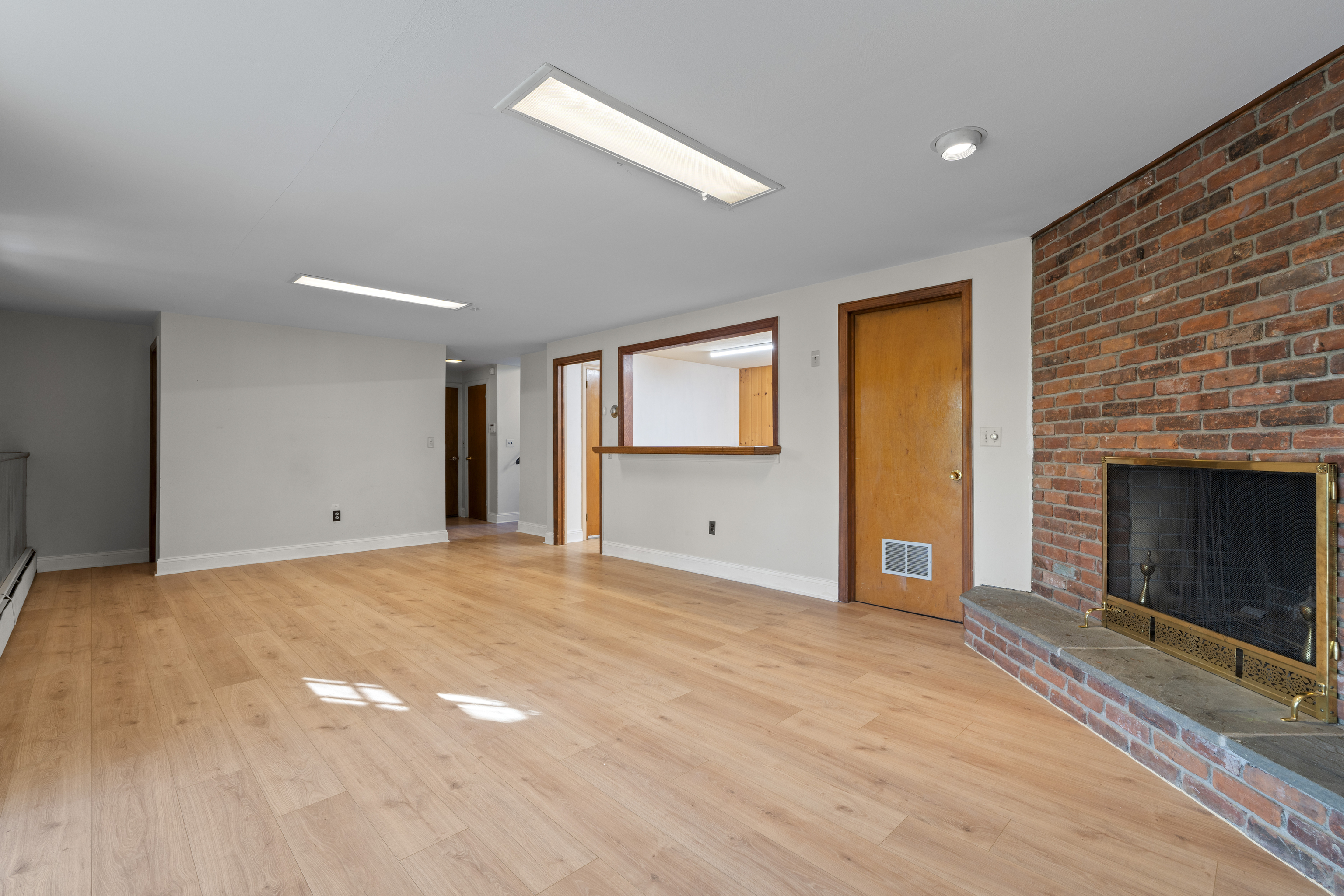3 Parsell Lane Westport, CT 06880 - Photo 19 of 29 a view of an empty room with a fireplace and a window