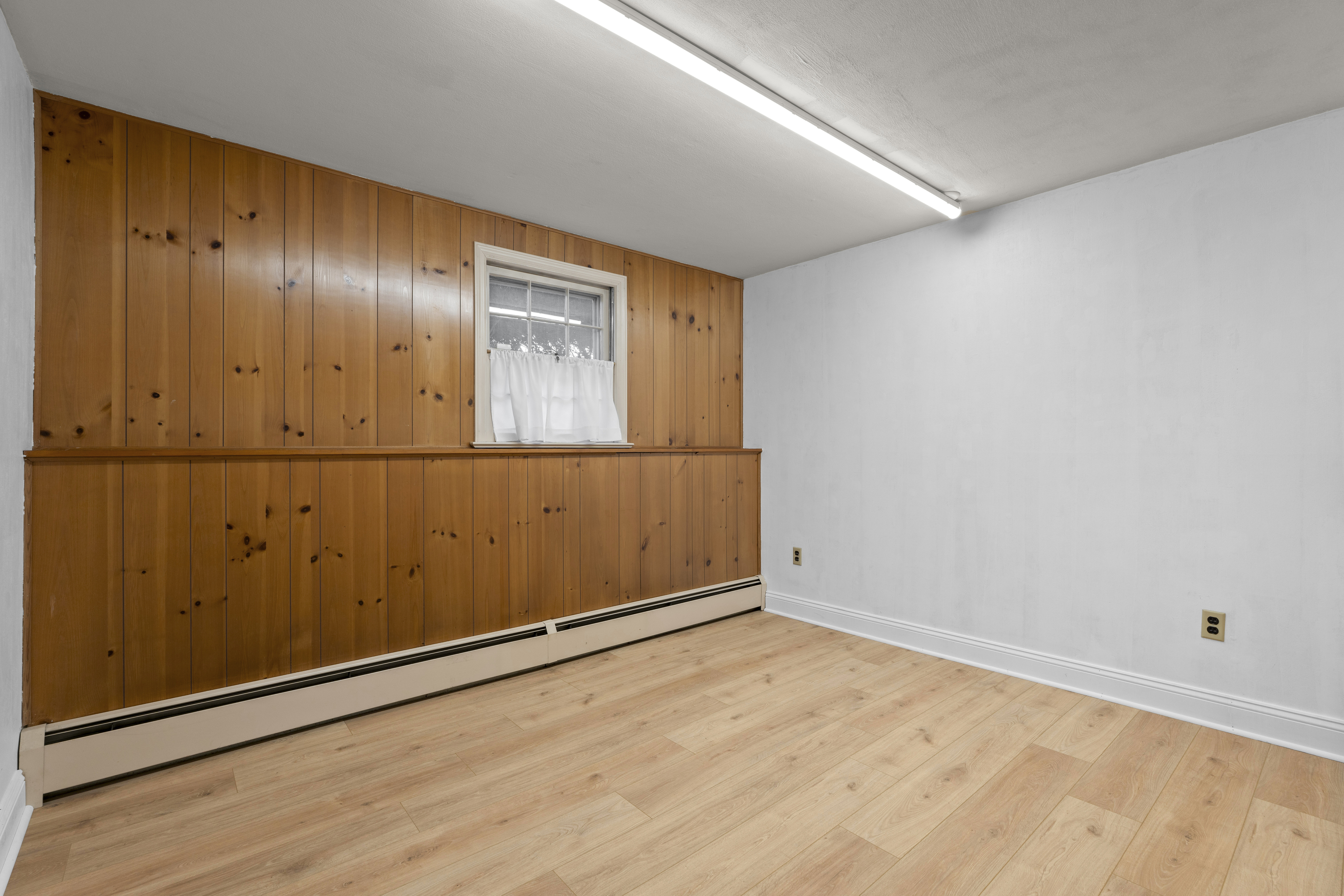 3 Parsell Lane Westport, CT 06880 - Photo 23 of 29 an empty room with wooden floor