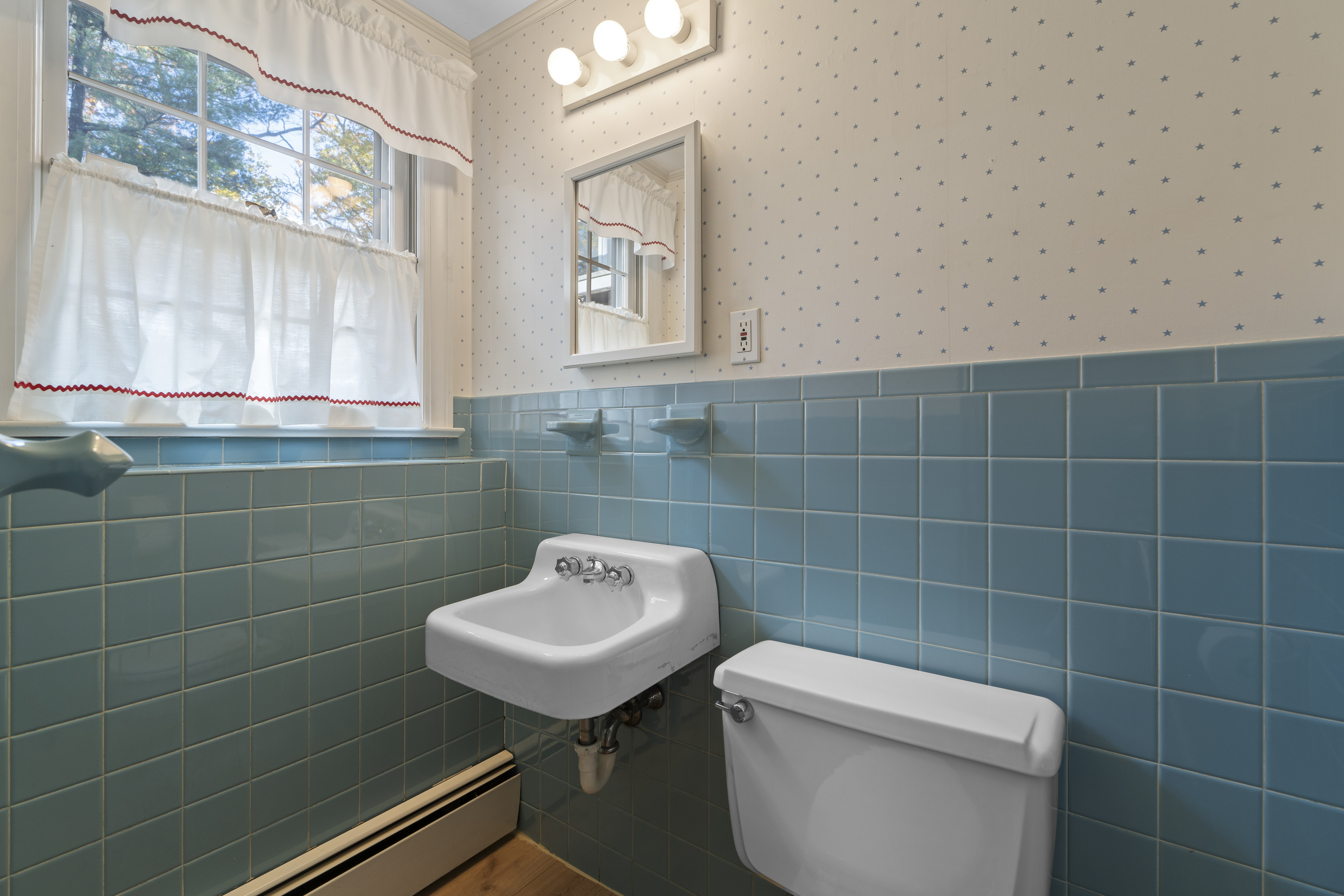 3 Parsell Lane Westport, CT 06880 - Photo 24 of 29 a bathroom with a toilet a sink and mirror