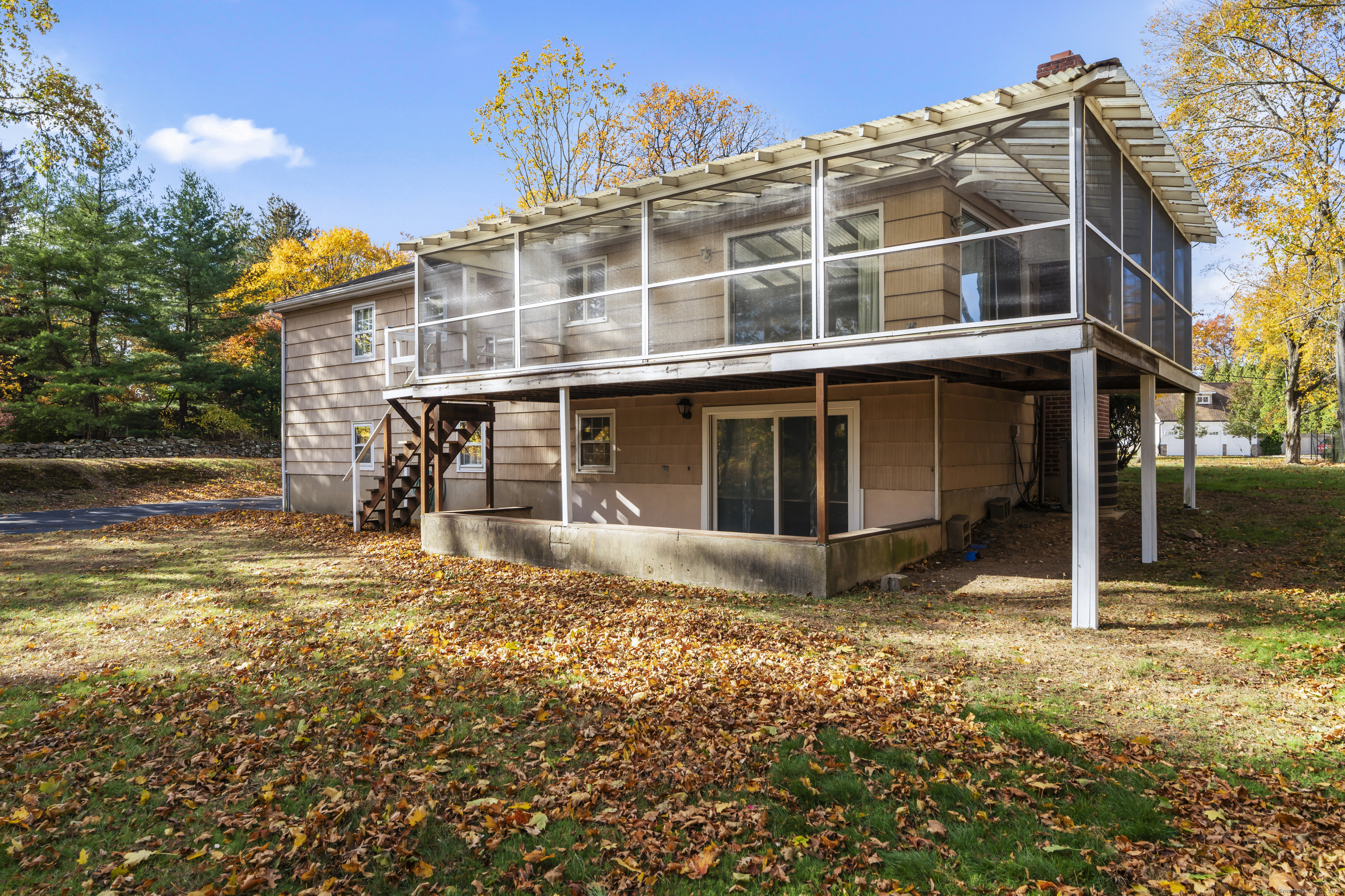 3 Parsell Lane Westport, CT 06880 - Photo 29 of 29 a front view of a house with a yard