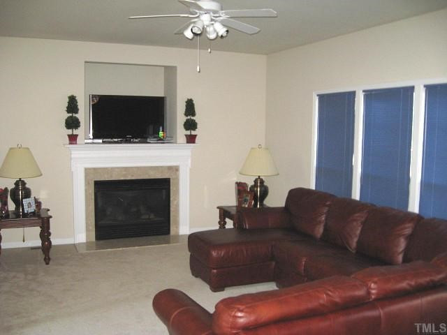 6607 Herndon Road Durham, NC 27713 - Photo 6 of 12 Great family room with ceiling fan & gas log fireplace Den/Family/Great Room