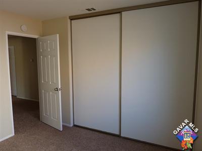 1539 Kings Road Palmdale, CA 93551 - Photo 14 of 22 a view of an entryway with wooden floor