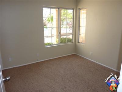 1539 Kings Road Palmdale, CA 93551 - Photo 15 of 22 an empty room with a window