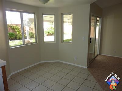 1539 Kings Road Palmdale, CA 93551 - Photo 8 of 22 an empty room with a window