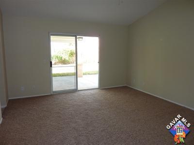 1539 Kings Road Palmdale, CA 93551 - Photo 9 of 22 a view of an empty room with a window