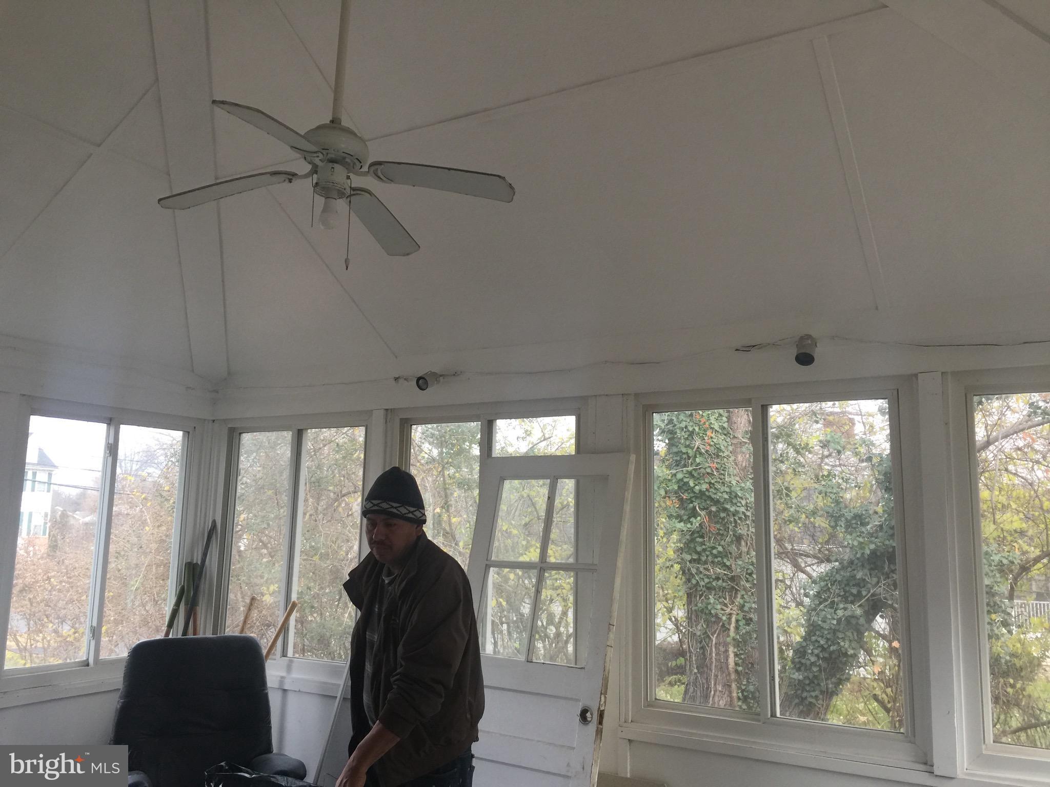 9101 Sudley Road Manassas, VA 20110 - Photo 14 of 16 a living room with furniture and a large window