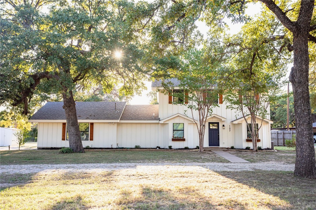 107 Spring Creek Street Waco, TX 76705 - Photo 2 of 78 a view of a white house with a yard