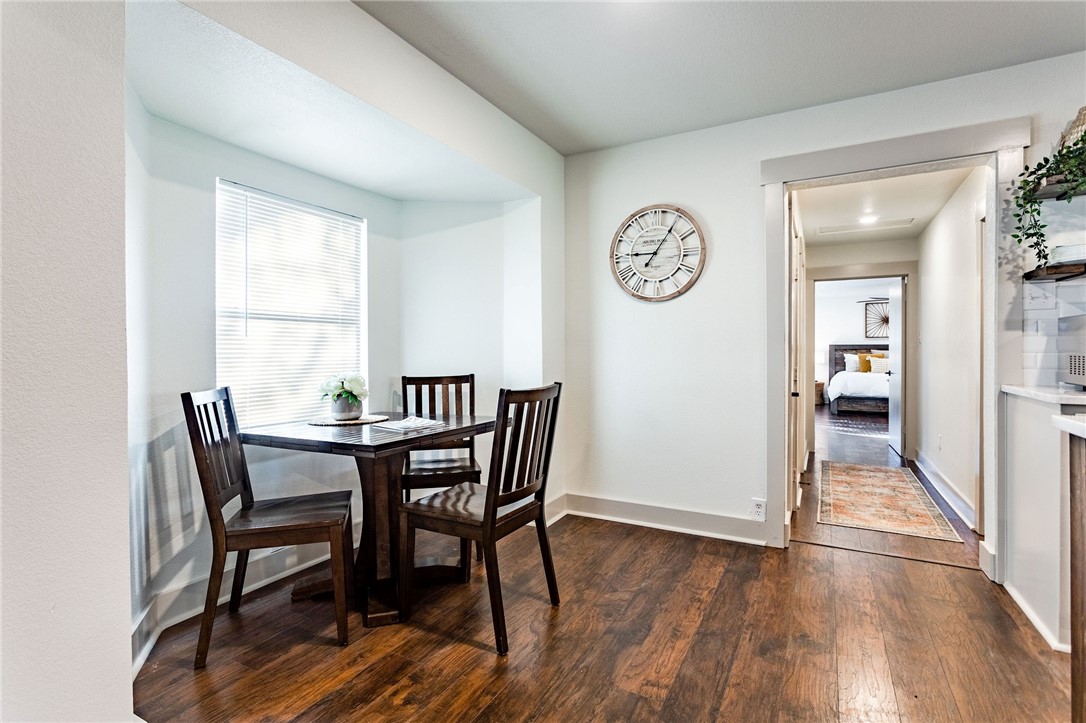 107 Spring Creek Street Waco, TX 76705 - Photo 28 of 78 a view of a dining room with furniture window and wooden floor