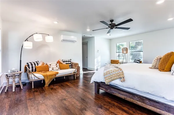 a bathroom with a glass shower door
