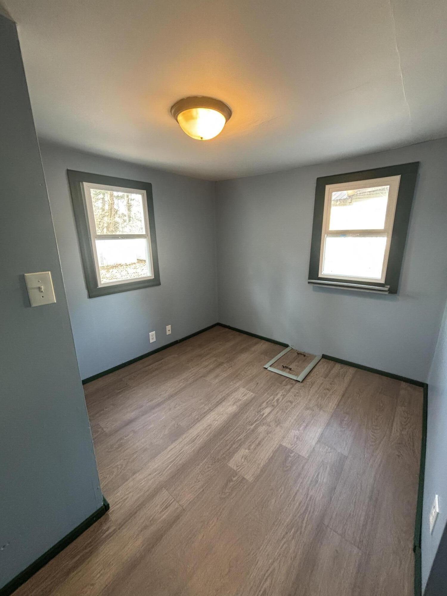 23618 Tyler Street Shelby, IN 46356 - Photo 4 of 8 an empty room with a window