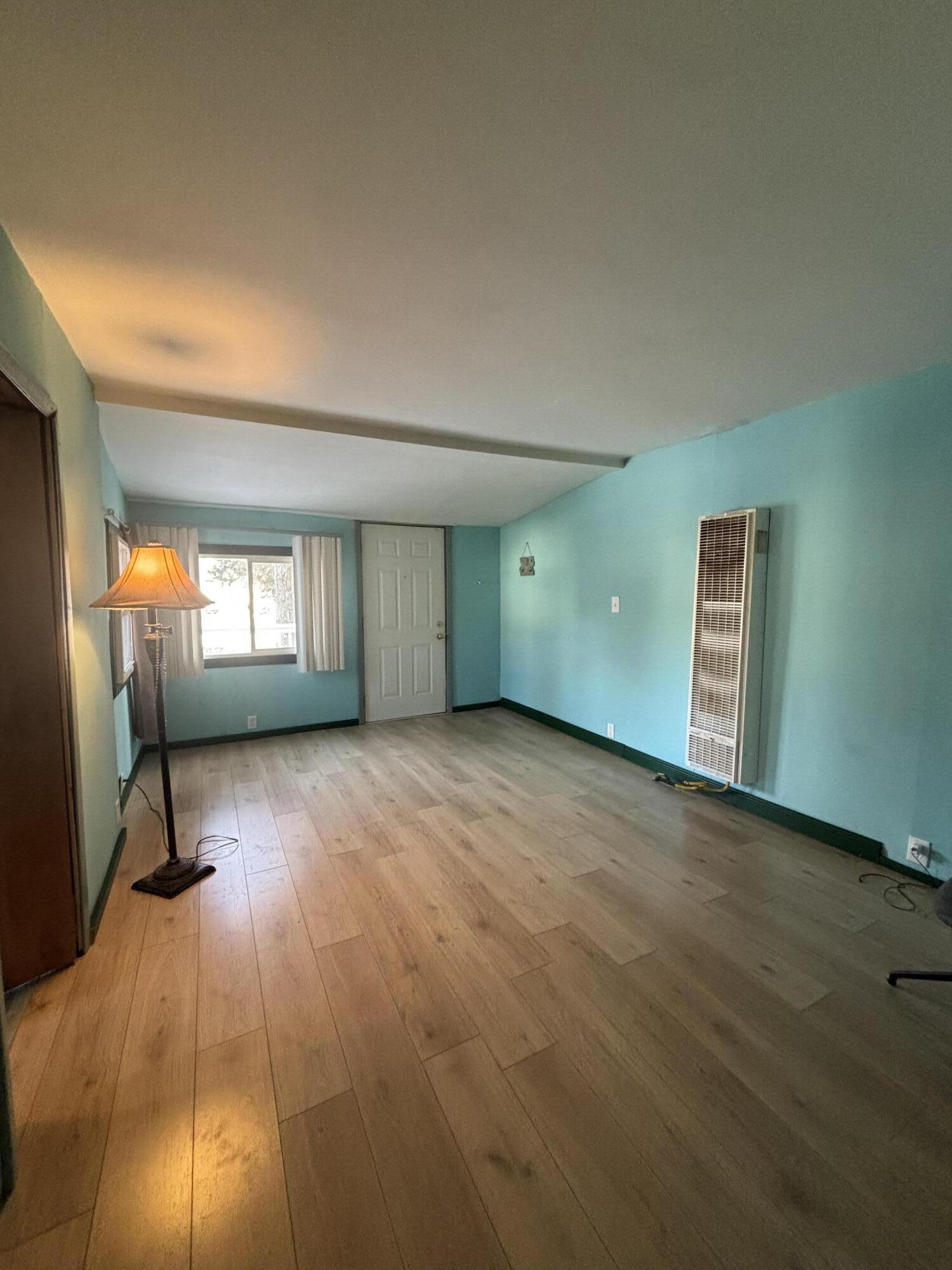 23618 Tyler Street Shelby, IN 46356 - Photo 6 of 8 a view of a livingroom with a fireplace
