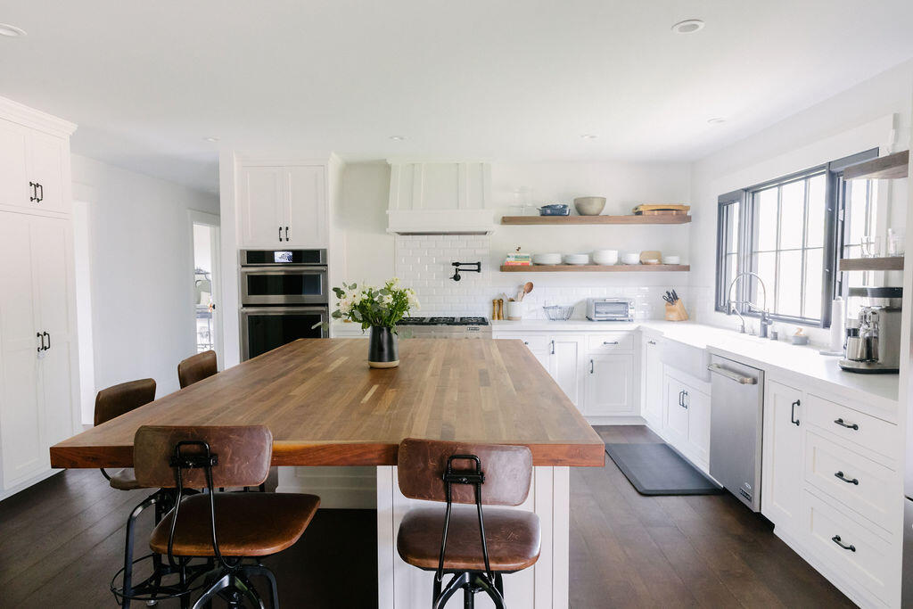 4140 Marina Drive Santa Barbara, CA 93110 - Photo 8 of 80 a kitchen with a table chairs sink and cabinets
