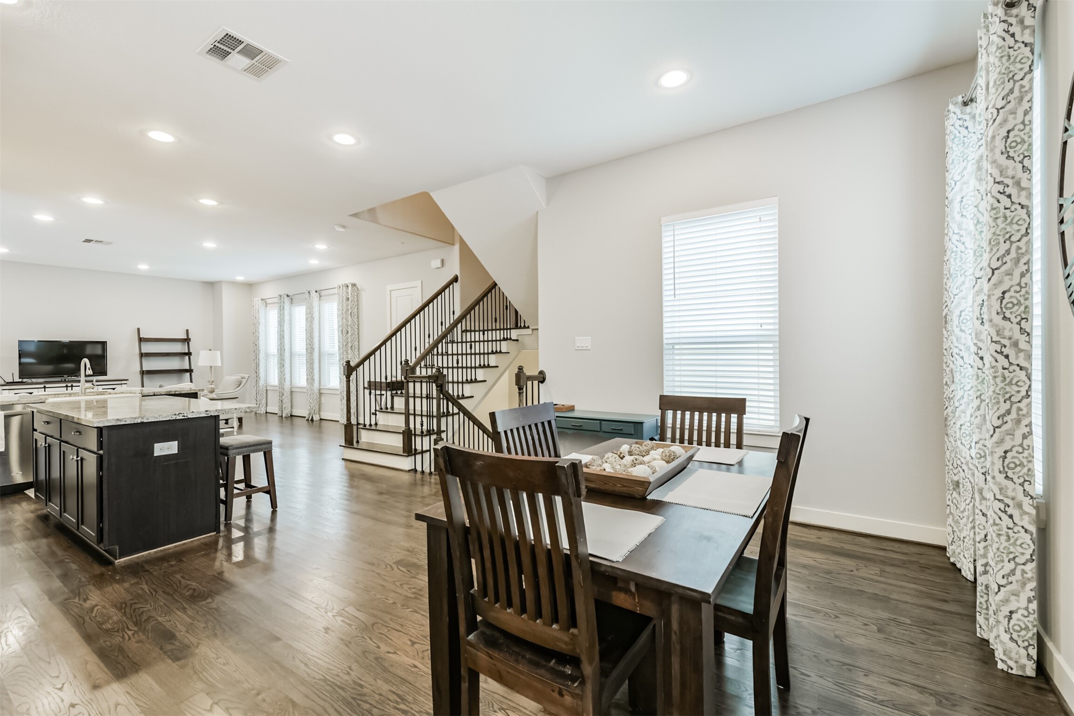 6623 Letein Street Houston, TX 77008 - Photo 15 of 37 The second floor features tall ceilings, natural light, and real oak floors stained in a neutral warm grey.