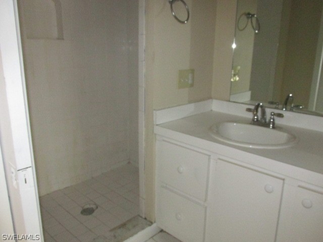 19185 Coconut Road Fort Myers, FL 33967 - Photo 11 of 13 a bathroom with a sink and shower