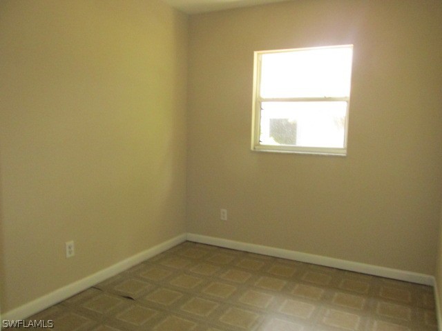 19185 Coconut Road Fort Myers, FL 33967 - Photo 13 of 13 an empty room with a window