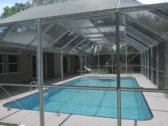 19185 Coconut Road Fort Myers, FL 33967 - Photo 3 of 13 a view of a backyard
