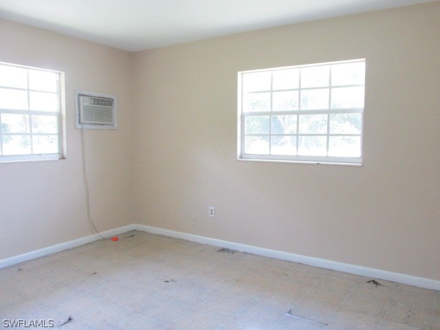 19185 Coconut Road Fort Myers, FL 33967 - Photo 5 of 13 an empty room with a window