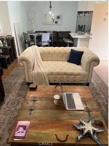 a living room with furniture and a couch