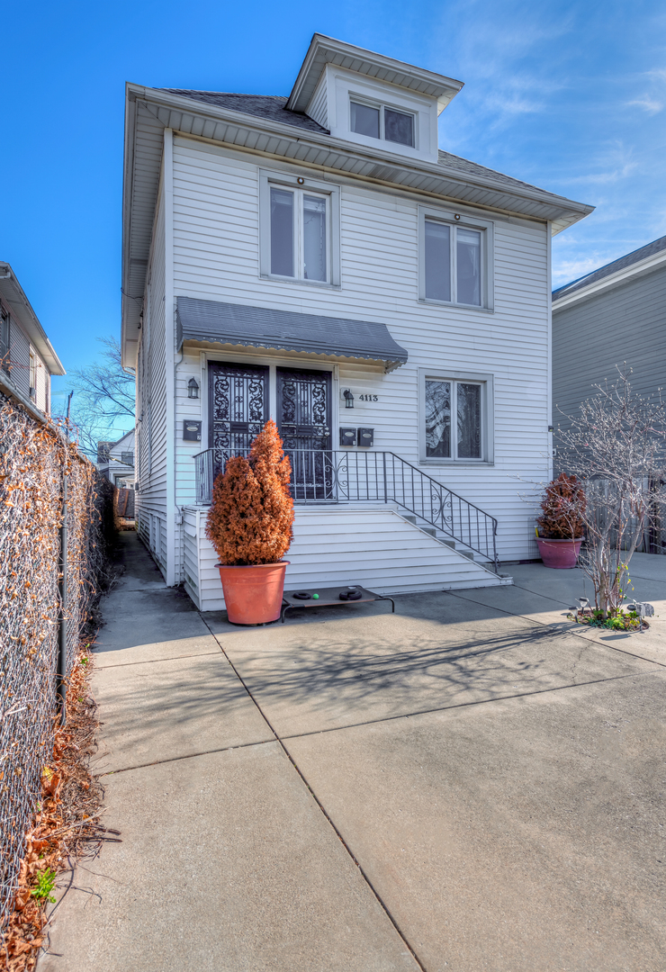 4113 North Kenneth Avenue, Unit 1 Chicago, IL 60641 - Photo 1 of 8