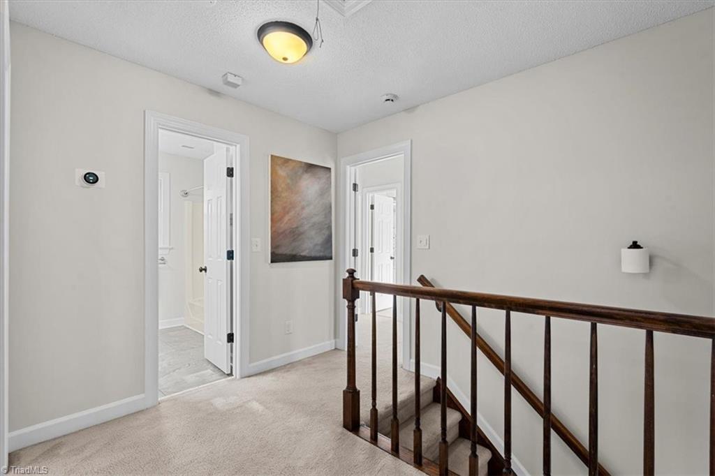 3329 Cardinal Ridge Drive Greensboro, NC 27410 - Photo 24 of 45 The second floor landing is a great place to display art.
