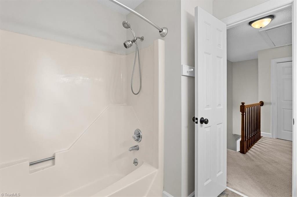 3329 Cardinal Ridge Drive Greensboro, NC 27410 - Photo 34 of 45 Hallway bathroom, with shower view.