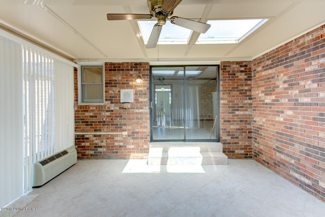 5914 Apache Road Louisville, KY 40207 - Photo 23 of 53 View from rear of sun room toward den.