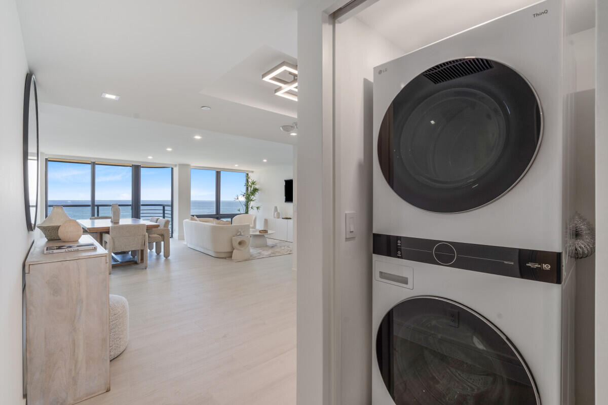 250 South Ocean Boulevard, Unit 11F Boca Raton, FL 33432 - Photo 15 of 45 a living room with furniture and a fireplace