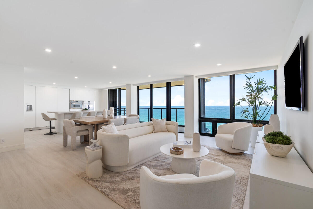 250 South Ocean Boulevard, Unit 11F Boca Raton, FL 33432 - Photo 3 of 45 a living room with furniture and a large window