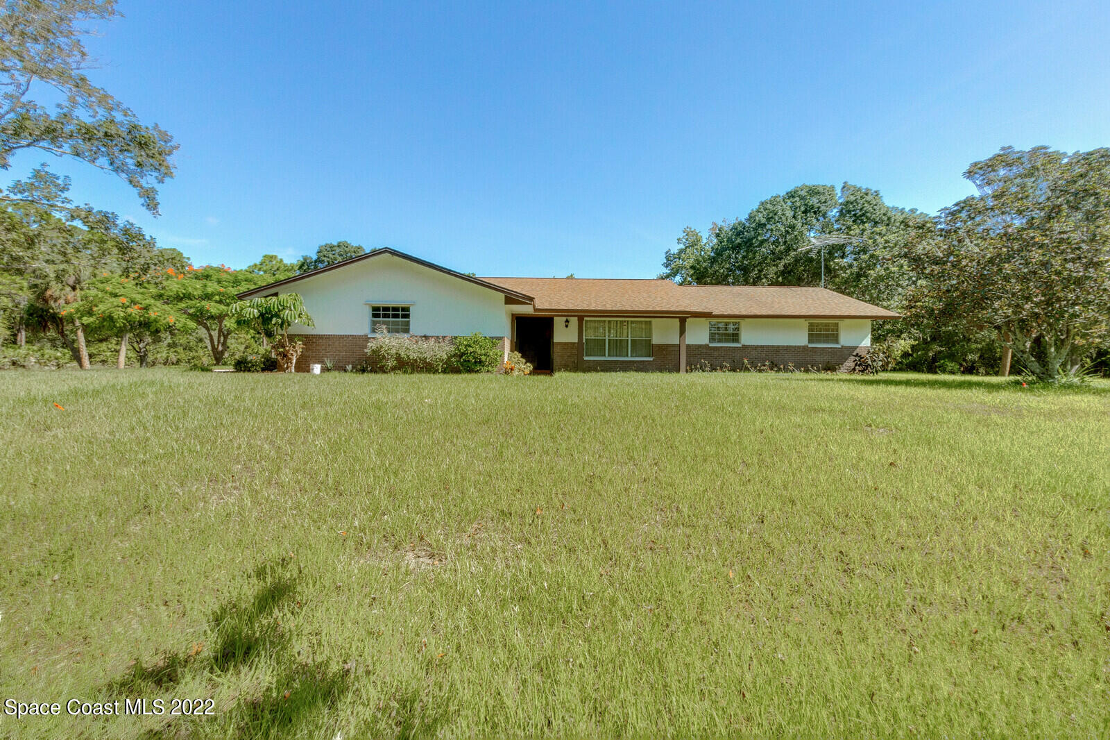 200 Atz Road Malabar, FL 32950 - Photo 1 of 30 a view of a house with a big yard