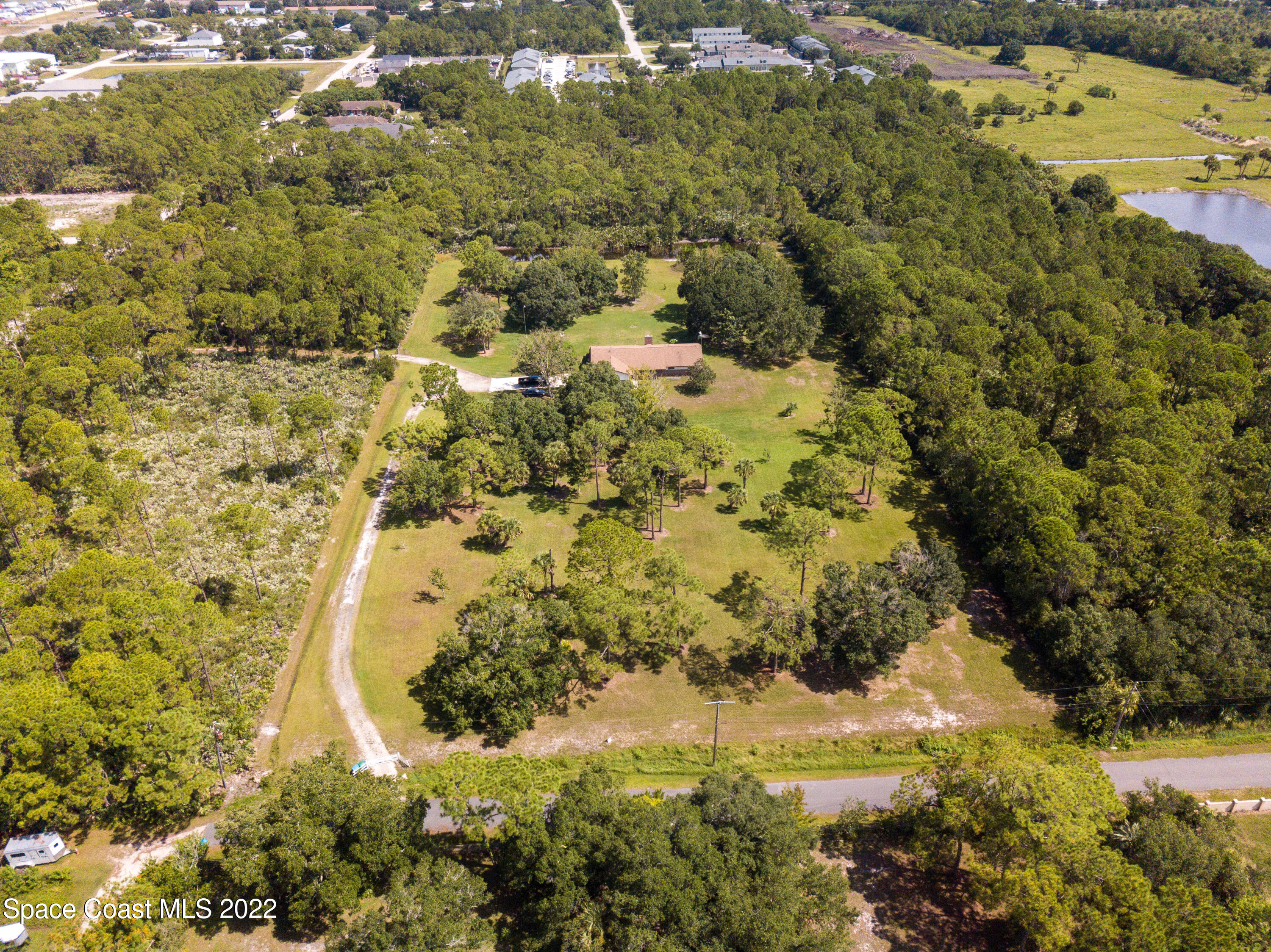 200 Atz Road Malabar, FL 32950 - Photo 14 of 30 a view of a yard with green space