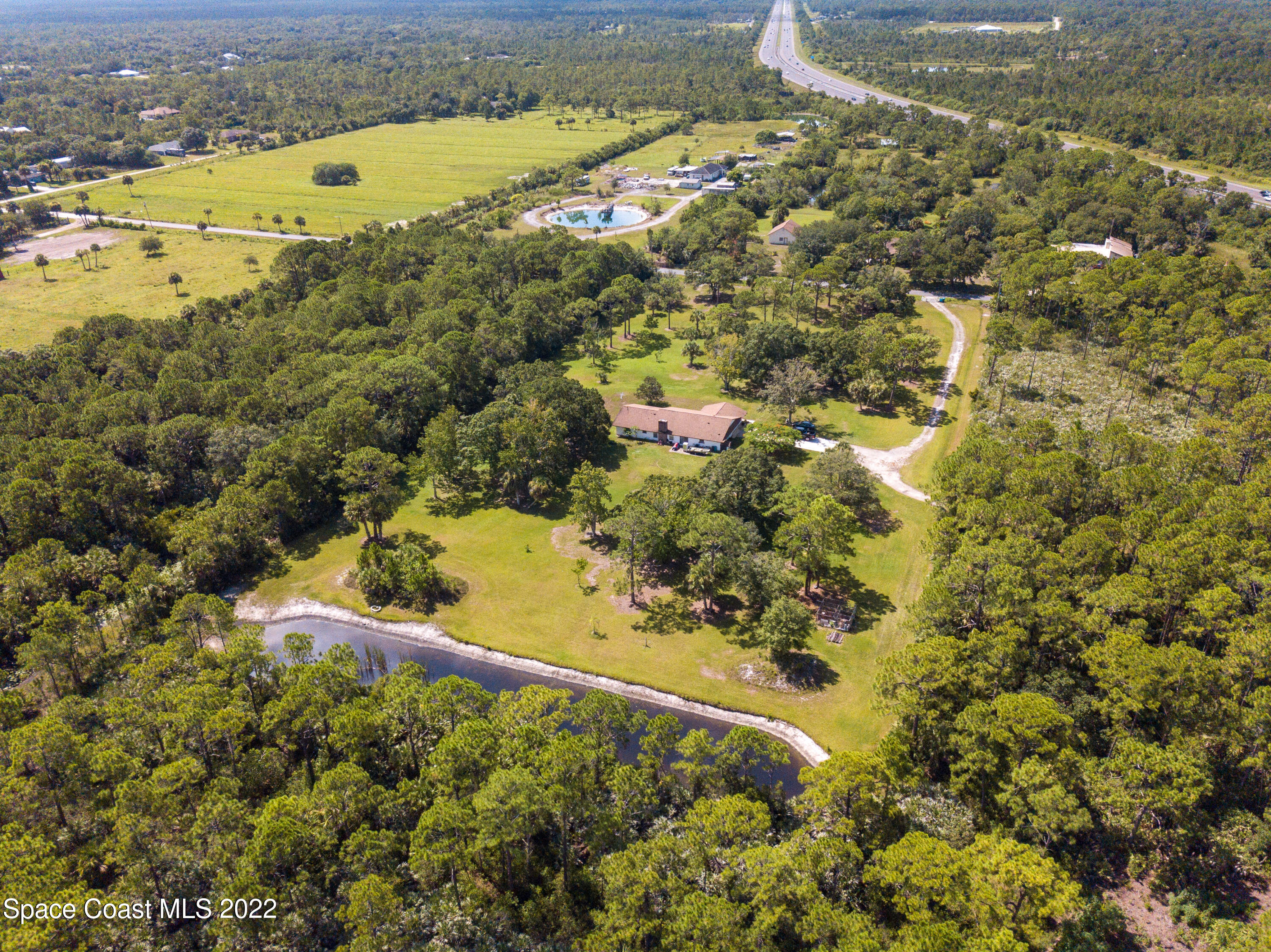 200 Atz Road Malabar, FL 32950 - Photo 15 of 30 a view of a lake from a yard