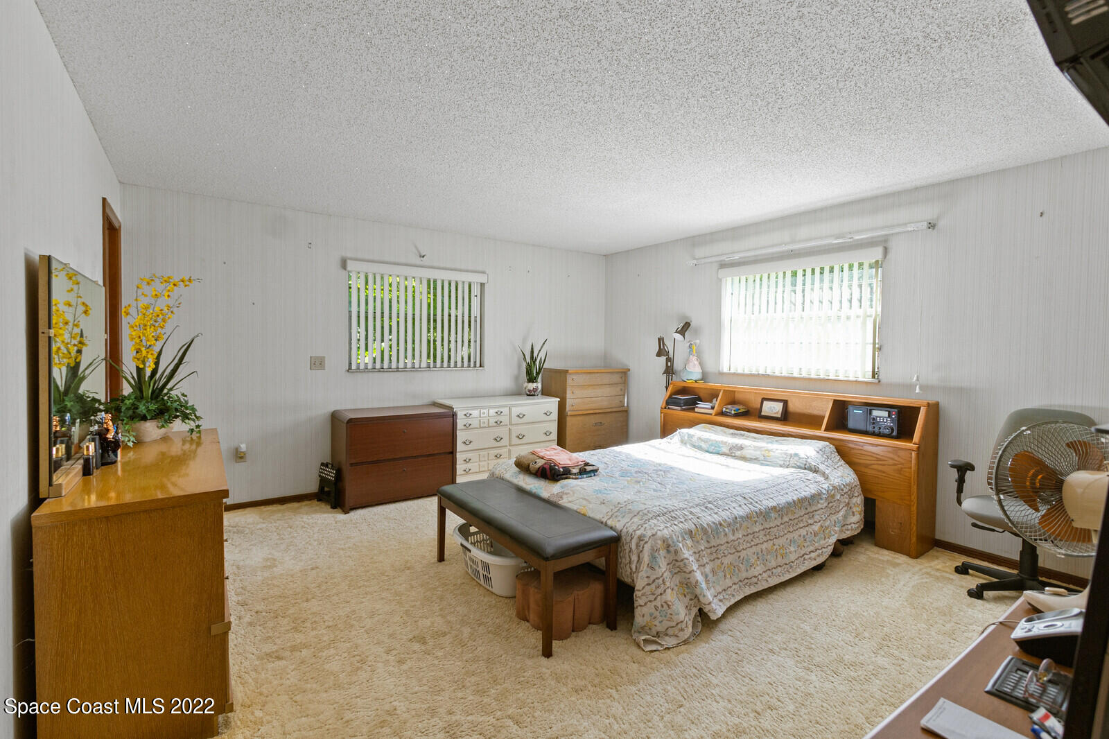 200 Atz Road Malabar, FL 32950 - Photo 25 of 30 a bedroom with a bed and a window