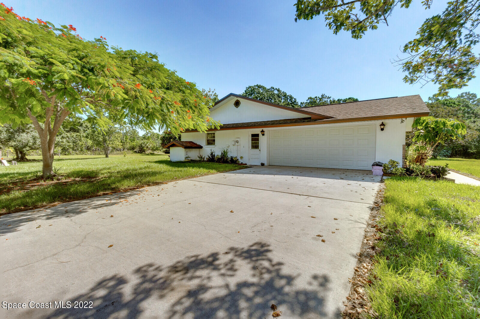 200 Atz Road Malabar, FL 32950 - Photo 4 of 30 front view of a house with a yard