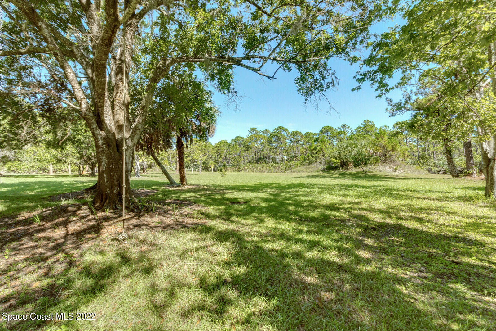 200 Atz Road Malabar, FL 32950 - Photo 9 of 30 a view of outdoor space with trees all around