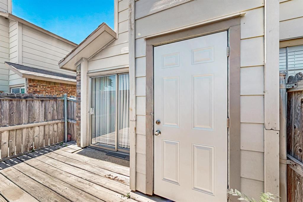 11311 Audelia Road, Unit 165 Dallas, TX 75243 - Photo 31 of 31 Doorway to property featuring a wooden deck