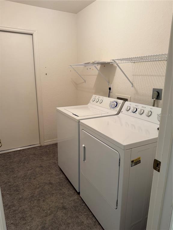 19260 Northwest 88th Avenue Road Reddick, FL 32686 - Photo 21 of 41 a utility room with dryer and washer