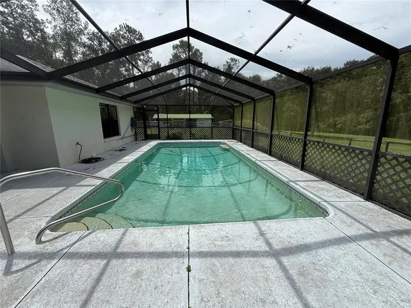 a view of a backyard of a house