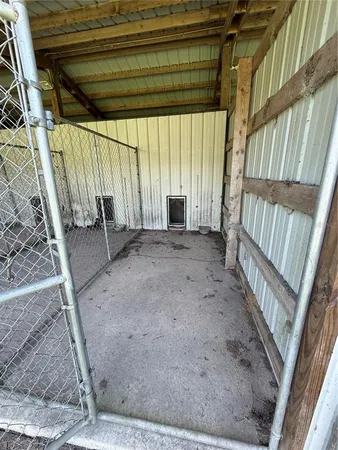 a view of an empty room with stairs